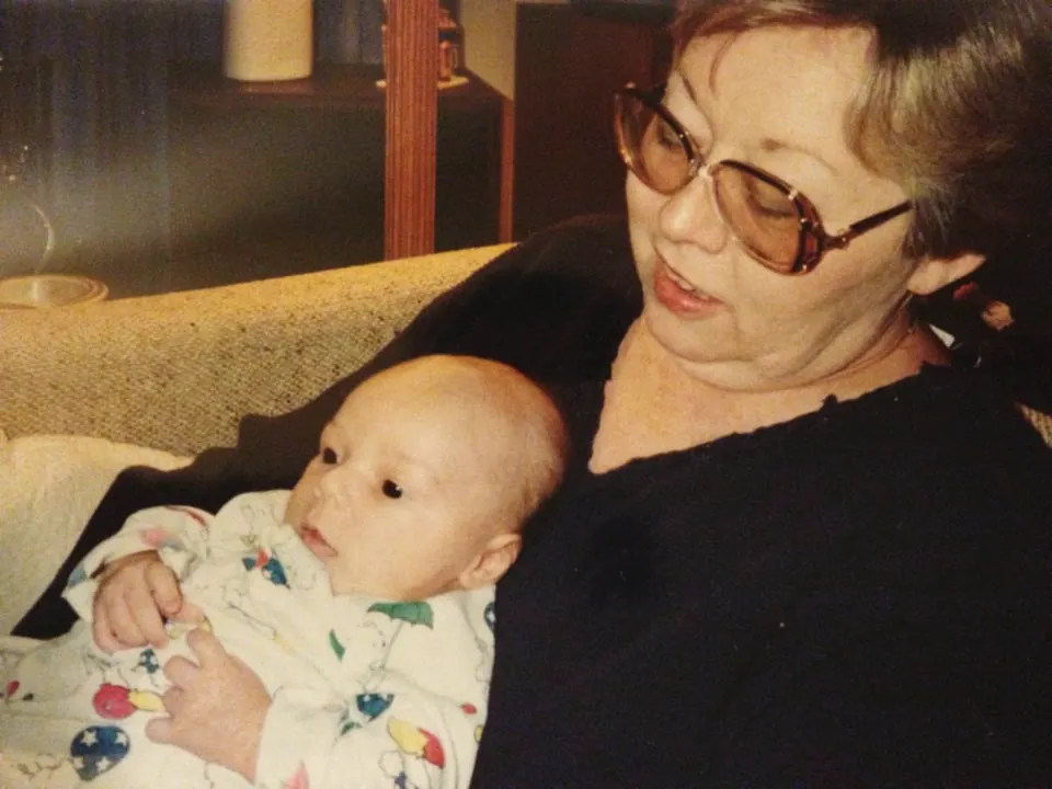 Nana holding me as a baby, at her house in Columbia.