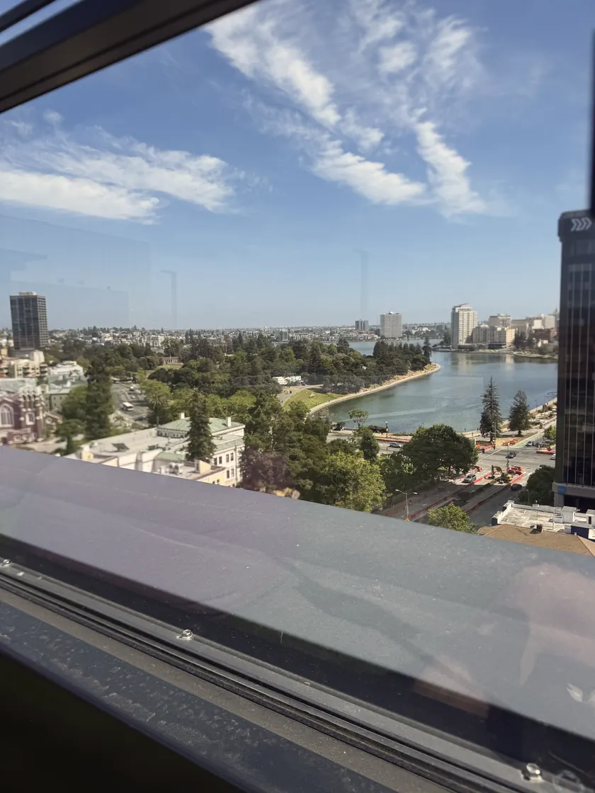 Lake Merritt and the Oakland skyline from a high window, the first morning.
